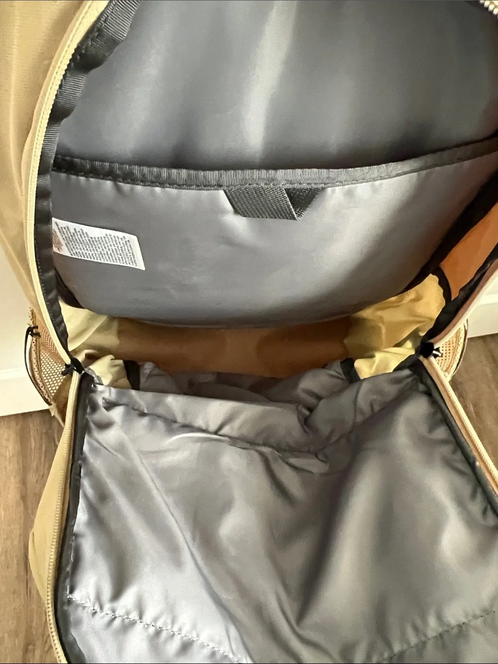 The North Face Jester Backpack in Beige with Olive Bungee